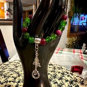 Handmade by me Red garnet and Peridot bracelet wChristmas charms. Genuine stones